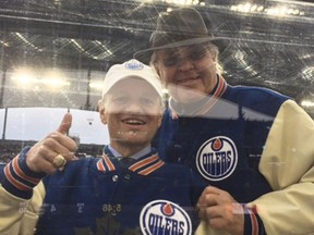 Brian Ross, left, and Glen Sather in Winnipeg