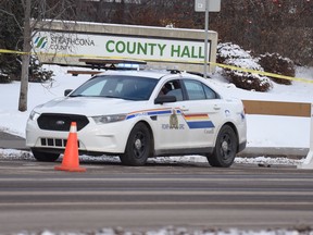 RCMP cruisers stage outside the Strathcona County Community Centre and county hall in Sherwood Park on Wednesday, Nov. 7, 2018.