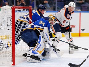 Jake Allen #34 of the St. Louis Blues makes a save against the Edmonton Oilers at the Enterprise Center on December 5, 2018 in St. Louis, Missouri.