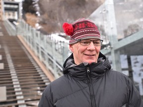 Todd Weiss talking to the reporter about the ups and downs of 2018 by the funicular in Edmonton, December 24, 2018. Ed Kaiser/Postmedia
