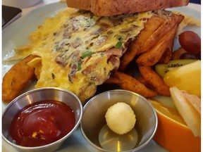 The Farmer John's Delight omlette is one of 70 items on the trendy new OEB downtown breakfast spot.  GRAHAM HICKS/EDMONTON SUN