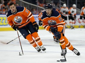 The Edmonton Oilers' Caleb Jones (82) takes part in the warm-up prior to the game against the Philadelphia Flyers during first period NHL action at Rogers Place, in Edmonton Friday Dec. 14, 2018.