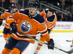 The Edmonton Oilers' Caleb Jones (82) takes part in the warm-up prior to the game against the Philadelphia Flyers during first period NHL action at Rogers Place, in Edmonton Friday Dec. 14, 2018.