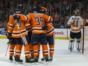 The Edmonton Oilers celebrate Alex Chiasson's (39) goal against the Philadelphia Flyers during first period NHL action at Rogers Place, in Edmonton Friday Dec. 14, 2018.