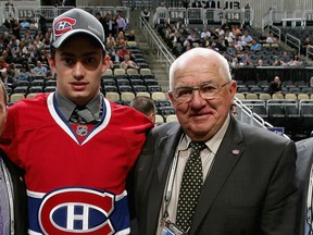 Scout Elmer Benning is seen with Tim Bozon, drafted 64th overall by the Montreal Canadiens, scout Elmer Benning during Day 2 of the 2012 NHL Entry Draft at Consol Energy Center on June 23, 2012 in Pittsburgh, PN. (Photo by Dave Sandford/NHLI via Getty Images)