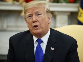 U.S. President Donald Trump speaks during a meets with Democratic leaders in the Oval Office of the White House in Washington on Tuesday, Dec. 11, 2018.