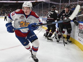 Edmonton Oil Kings Liam Keeler (12) avoids the Red Deer Rebels getting after the puck during WHL action at Rogers Place in Edmonton, December 30, 2018. Ed Kaiser/Postmedia