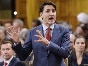 Prime Minister Justin Trudeau rises during question period in the House of Commons on Parliament Hill in Ottawa on Wednesday, Dec.12, 2018. (THE CANADIAN PRESS/Adrian Wyld)