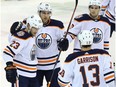 Edmonton Oilers centre Ryan Spooner (left) is congratulated on his goal against the Winnipeg Jets in Winnipeg on Thurs., Dec. 13, 2018 by Leon Draisaitl, Jason Garrison and Chris Wideman (from left).