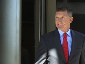 In this July 10, 2018, file photo, former Trump national security adviser Michael Flynn leaves the federal courthouse in Washington, following a status hearing.