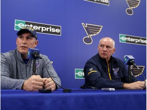 Craig Berube, left, speaks during a news conference along side St. Louis Blues general manager Doug Armstrong after Berube was named interim head coach of the NHL hockey team Tuesday, Nov. 20, 2018, in St. Louis. The Blues fired head coach Mike Yeo following a 2-0 loss to the Los Angeles Kings Monday night.
