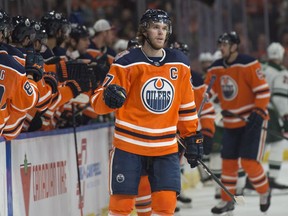 Connor McDavid of the Edmonton Oilers celebrates his first period goal against the Minnesota Wild at Rogers Place in Edmonton on  December 7, 2018.   Shaughn Butts / Postmedia