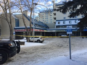 Edmonton, Jan. 20, 2019. Edmonton police vehicles are shown around the scene of a suspicious death Sunday in the parking lot of a shopping area near Calgary Trail and 24th Avenue. (Photo by Anna Junker)