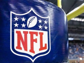 An NFL logo on a goal post padding before a preseason NFL football game between the Detroit Lions and the Cleveland Browns at Ford Field in Detroit on Aug. 9, 2014. (AP Photo/Rick Osentoski)