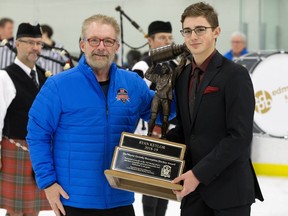 Quikcard's Lyle Best poses for a photo with Wayne Gretzky Award winner Ryan Keylor during the Quikcard Edmonton Minor Hockey Week opening ceremonies at the Meadows Community Recreation Centre, 2704 - 17 Street, in Edmonton Wednesday Jan. 9, 2019.