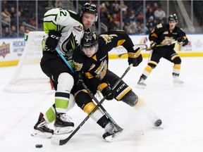 Edmonton's Liam Keeler, left, battles Brandon's Vincent Iorio during a WHL hockey game between the Edmonton Oil Kings and the Brandon Wheat Kings at Rogers Place in Edmonton on Tuesday, Jan. 29, 2019.