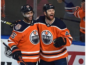 Edmonton Oilers Zack Kassian (44) celebrates his first goal with Darnell Nurse (25) against the Buffalo Sabres during NHL action at Rogers Place in Edmonton, January 14, 2019.