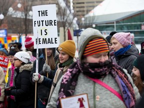 Supporters brave the cold during the Women's March at Sir Winston Churchill Square in Edmonton, Alta., on Saturday, Jan. 19, 2019.