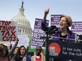 Sen. Elizabeth Warren (D-MA) addresses a rally against the Republican tax plan outside the U.S. Capitol Nov. 1, 2017 in Washington, D.C.