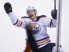 Edmonton Oilers right wing Alex Chiasson (39) celebrates his shootout game-winning goal following NHL action against the Vancouver Canucks at Rogers Arena, in Vancouver, Wednesday, Jan. 16, 2019.