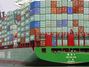 Cargo stacked high on a China Shipping Line freighter.