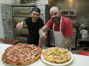 Ryan Brodziak, left, and Mark Bellows have opened a new pizza place in Edmonton called the Pink Gorilla Pizzeria, located in the former Park Allen Restaurant location at 7018-109 St.