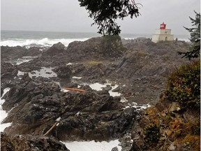 Storm watchers gather at the Amphitrite Lighthouse in Ucluelet. Photo by Pamela Roth