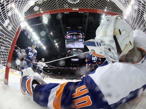Robin Lehner #40 of the New York Islanders makes a third-period save against the Edmonton Oilers at the Barclays Center on Feb. 16, 2019, in the Brooklyn borough of New York City. The Islanders defeated the Oilers 5-2.