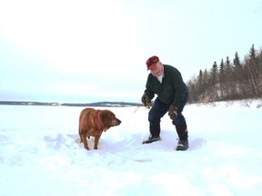 Neil and Penny ice-angling for walleye at Lac Bellevue. Neil Waugh/Edmonton Sun