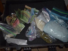 Mayerthorpe RCMP said "a significant amount of drugs" were seized on Feb. 18 after search warrants were executed in the western Alberta communities of Sangudo and Rochfort Bridge. (Supplied photos/RCMP)