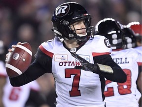Ottawa Redblacks quarterback Trevor Harris prepares to throw the ball during the first half of the 106th Grey Cup against the Calgary Stampeders at Commonwealth Stadium in Edmonton on Nov. 25, 2018.
