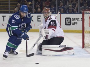 Vancouver Canucks forward Sam Gagner (89) takes shot on net as Arizona Coyotes goaltender Darcy Kuemper (35) makes the save during first period preseason action in Kelowna , B.C. on Saturday September 29, 2018.