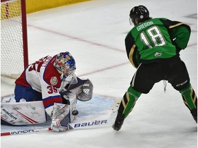 Edmonton Oil Kings goalie Todd Scott makes the save off of Prince Albert Raiders Noah Gregor's (18) stick on a break-away during WHL action at Rogers Place in Edmonton, February 4, 2019.