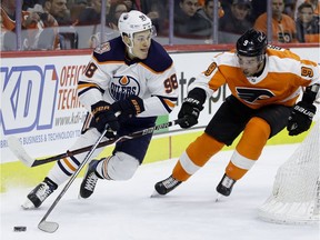 Edmonton Oilers' Jesse Puljujarvi, left, tries to keep the puck away from Philadelphia Flyers' Ivan Provorov during the first period of an NHL hockey game, Saturday, Feb. 2, 2019, in Philadelphia. Matt Slocum / AP
