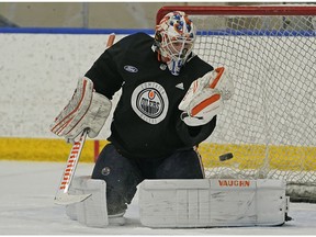 Edmonton Oilers goalie Mikko Koskinen looks for the puck during team practice in Edmonton on Tuesday February 12, 2019.