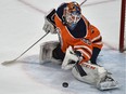 Edmonton Oilers goalie Cam Talbot (33) makes a save against the Chicago Blackhawks during NHL action at Rogers Place in Edmonton, February 5, 2019.