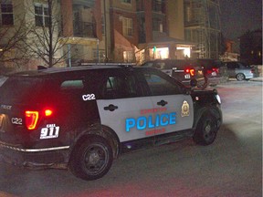 Edmonton police investigate a shooting at an apartment complex near 114 Street and Ellerslie Drive on Saturday, Feb. 10, 2019. Three men in their 30s were injured, including one who is in hospital in serious, but stable, condition.