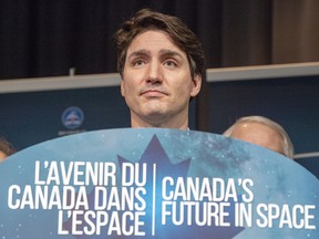 Prime Minister Justin Trudeau announces that Canada will take part in an international lunar space station project at the Canadian Space Agency headquarters Thursday, February 28, 2019 in St. Hubert, Que.THE CANADIAN PRESS/Ryan Remiorz ORG XMIT: RYR105
