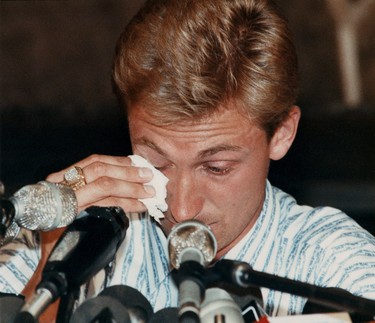 Aug. 9, 1988. Left to right; Ex-Edmonton Oilers superstar Wayne Gretzky wipes a tear as he tries to talk at the press conference at Molson House in Edmonton Alta., on Aug. 9, 1988 announcing that he was traded (and sold) to the LA Kings, shocking the sporting world. Perry Mah/Edmonton Sun