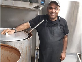 Zee Zaidi, proprietor of the ever-growing Remedy Cafe chain, shows off his "chai factory" in the kitchen of his original 109 St. outlet. GRAHAM HICKS/EDMONTON SUN