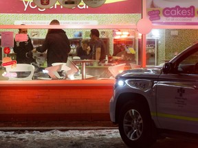 Edmonton Police Service officers investigate a stabbing in Garneau near 8703 109 Street in Edmonton, on Tuesday, March 5, 2019. Photo by Ian Kucerak/Postmedia