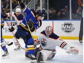 Edmonton Oilers' goalie Mikko Koskinen (19), of Finland, makes a save against St. Louis Blues' Alexander Steen (20) during the second period of an NHL hockey game Tuesday, March 19, 2019 in St. Louis.