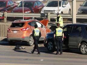 Edmonton police investigate a collision on Yellowhead Trail at 66 Street on Wednesday, March 20, 2019.