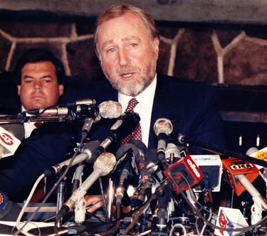 Aug. 9, 1988. Edmonton Oilers owner Peter Pocklington talks to the media as LA Kings owner Bruce McNall sits behind him at the press conference at Molson House in Edmonton Alta., on Aug. 9, 1988. Pocklington talked about trading his superstar player, Wayne Gretzky, to the LA Kings. The trade shocked the sporting world and changed the National Hockey League (NHL) forever. Perry Mah/Edmonton Sun