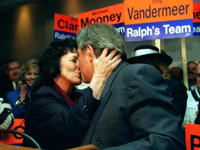 Ralph Klein and his wife Colleen kiss after his speech kicking off the 1997 election campaign. Klein won the 1992 provincial election after