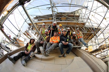 Workers pose for a team photo during a tour of the renovation of the Legislative dome in Edmonton, Alberta on Friday, October 11, 2013.  Perry Mah/ Edmonton Sun