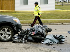 The 58 year-old female driver of a Suzuki Burgman scooter was killed in a collision with a GMC SUV on Friday, Sept. 14, 2018. The scooter slid on the road coming to rest in front of a Toyota RAV4 on Millwoods Road at 38 Avenue. Larry Wong/Postmedia