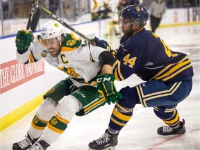 University of Alberta Golden Bears captain Riley Kieser is checked by University of Lethbridge Pronghorn's Evan Wardley during U Cup action Thursday, March 14, 2019 in Lethbridge, Alberta.