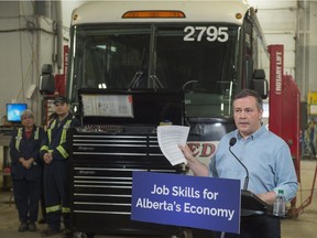 United Conservative Leader Jason Kenney, pictured at a Mar. 26, 2019 campaign event in Edmonton, holds a copy of the letter he sent to Toronto Mayor John Tory over a motion to sue oil and gas companies.