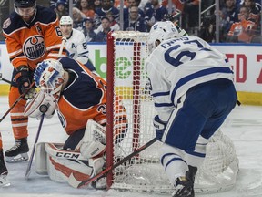 Anthony Stolarz (32)of the Edmonton Oilers,  makes the save on Tyler Ennis (63) of the Toronto Maple Leafs at Rogers Place in Edmonton on March 9, 2018.